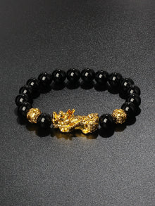 Black Obsidian Pixiu bead bracelet for prosperity focus, negativity defense, and daily use.