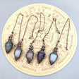 Black Obsidian & Quartz Pendulum for dowsing, divination, and energy work.