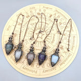 Black Obsidian & Quartz Pendulum for dowsing, divination, and energy work.