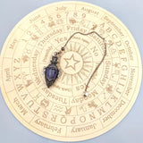 Black Obsidian & Quartz Pendulum for dowsing, divination, and energy work.