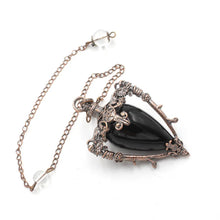 Black Obsidian & Quartz Pendulum for dowsing, divination, and energy work.