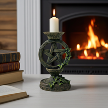 Black pentagram taper candle holder set of 2 for displaying taper candles in spiritual rituals, meditation spaces, and witchy decor.