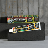 Black Seed Essential Toothpaste tube for cleaning teeth, maintaining oral care, and everyday breath freshness.
