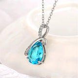 Blue & White Teardrop CZ pendant charm with polished stone setting for formal styling, layering, and occasion wear.