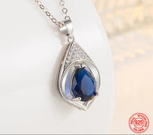 Blue Crystal Teardrop Necklace in 925 sterling silver pendant necklace for weddings, date nights, and dressy outfits.