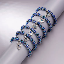 Blue evil eye bead charm bracelet for protective styling, gifting, and everyday spiritual jewelry use.