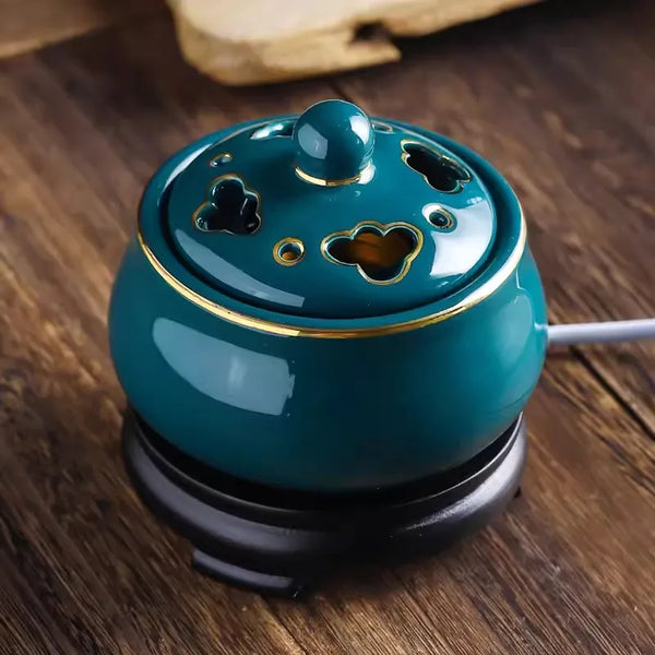 Blue Lotus electric ceramic incense burner for burning resin, incense, and aromatherapy during meditation and home fragrance use.