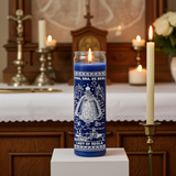 Our Lady of Regla blue devotional candle in tall glass jar for daily prayer, spiritual focus, and religious practice.