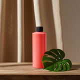 Bob Marley fragrance body oil for moisturizing the skin.