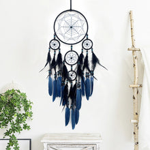 Boho dream catcher with feathers for wall decor, peaceful room styling, and decorative accent use.