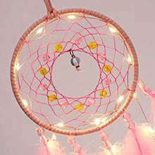 Pink and Purple Dream Catcher boho wall hanging for nursery decor, peaceful ambiance, and dream-inspired room styling.