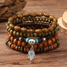 Handmade-style Tree of Life beaded bracelet with leather wrap strands for artisan-inspired fashion, gifting, and everyday wrist wear.