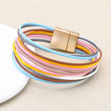 Braided leather boho heart charm bracelet for everyday fashion use, stacked bracelet styling, and casual outfit accessorizing.