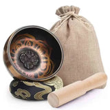 Brass 8cm Tibetan Singing Bowl with mallet for soothing tones, yoga practice, and spiritual ceremonies.