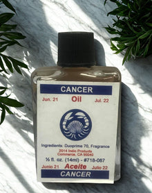 Cancer Wish Oil zodiac anointing oil bottle for Cancer sign rituals, meditation, and manifestation use.