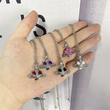 Trendy Silver Heart & Saturn Pendant necklace with celestial design for stylish accessorizing, gifting, and daily wear.