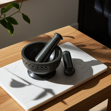 Celtic mortar and pestle bowl for crushing dried herbs, roots, and botanical blends for kitchen and spiritual use.