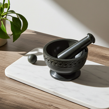 Celtic mortar and pestle set for grinding herbs, spices, resins, and ritual ingredients.