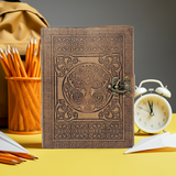 Celtic Tree of Life leather journal with latch closure for note-taking, personal reflection, and creative writing.