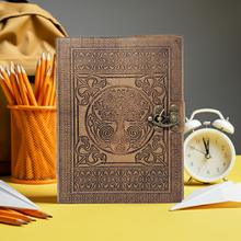 Celtic Tree of Life leather journal with latch closure for note-taking, personal reflection, and creative writing.