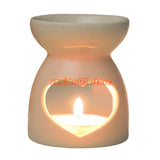 Ceramic essential oil burner with tealight for diffusing aromatic oils during meditation, rest, and home spa routines.
