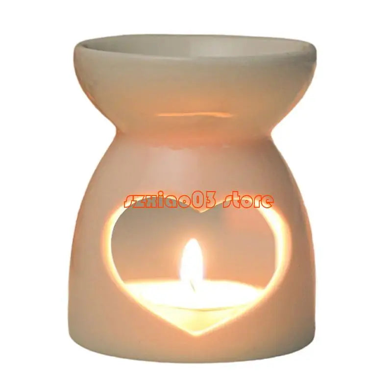 Ceramic essential oil burner with tealight for diffusing aromatic oils during meditation, rest, and home spa routines.