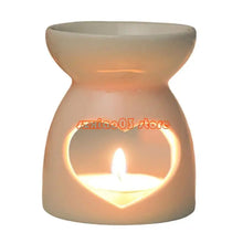 Ceramic essential oil burner with tealight for diffusing aromatic oils during meditation, rest, and home spa routines.