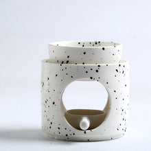 Ceramic incense burner holder for essential oils and incense use during yoga, meditation, and stress-relief routines.