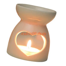 Ceramic oil burner with tealight holder for melting scented wax and diffusing essential oils in the home.