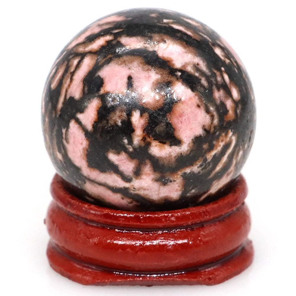 Chakra balancing crystal ball sphere for spiritual healing, meditation focus, and reiki energy work.