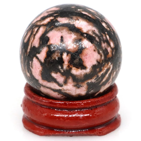 Chakra balancing crystal ball sphere for spiritual healing, meditation focus, and reiki energy work.