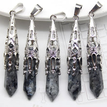 Chakra crystal pendulums healing tool for Reiki therapy, chakra alignment, and energy balancing.