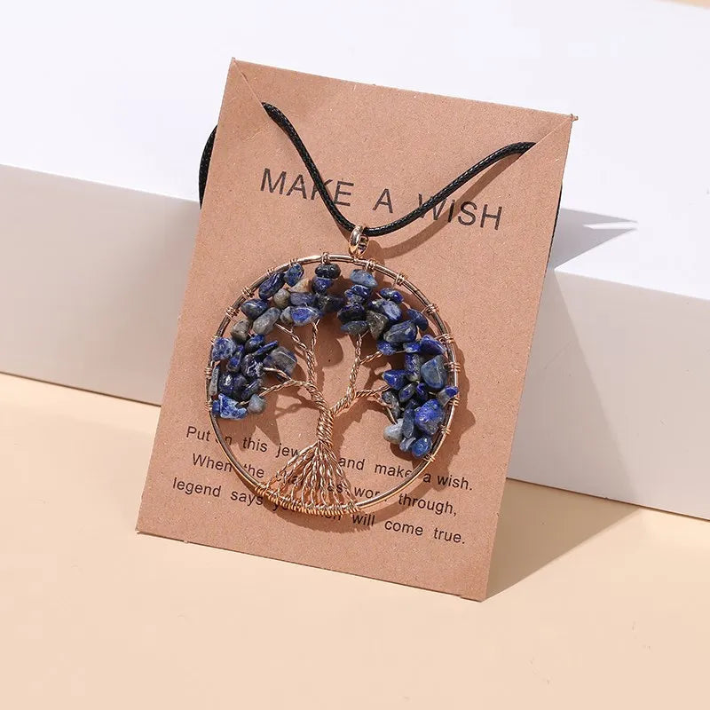 Chakra crystal Tree of Life pendant for holistic healing, mindful living, and spiritual jewelry use.