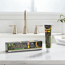 Charcoal Essential Toothpaste tube for daily brushing, oral hygiene, and fresh breath care.