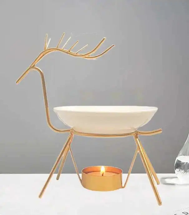 Chic copper tealight oil warmer for melting wax and warming aroma oils during relaxation and self-care routines.