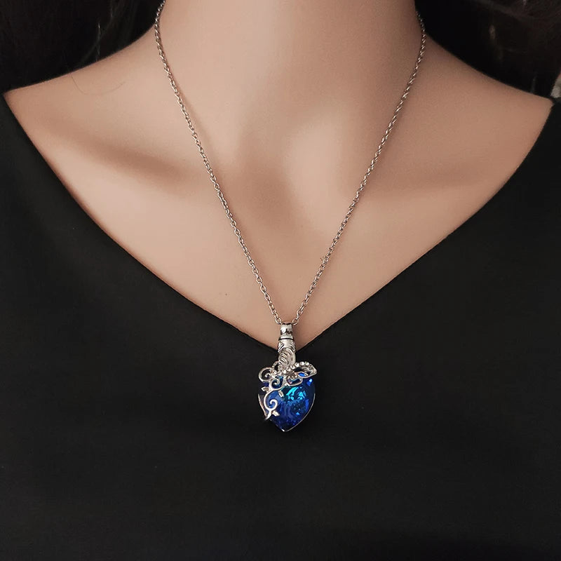 Classic sapphire drop necklace in silver for refined work attire, evening events, and layered jewelry styling.