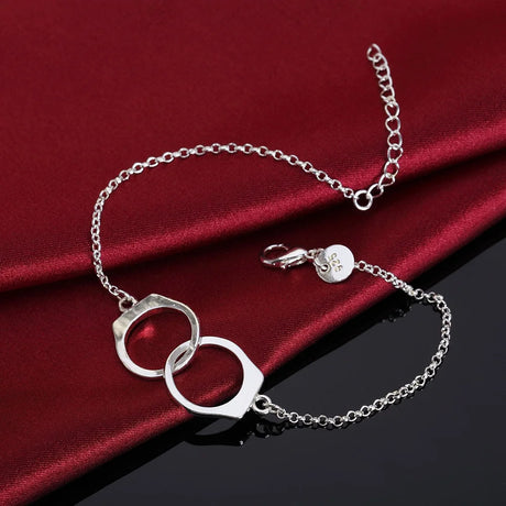 Classic silver twist chain bracelet in 4MM size for daily use, elegant accessorizing, and bracelet stacking.