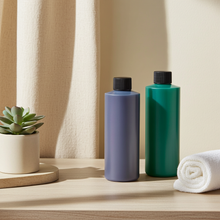 Coco Mango Body Oil bottle for moisturizing skin, locking in tropical fragrance, and everyday body care.