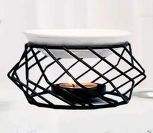 Copper scented oil burner for home use, ideal for warming aroma oils and adding decorative candlelight ambiance.