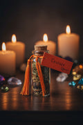 Courage pocket spell bottle with herbs and stones