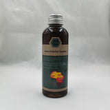 Crazy Growth Oil with Chebe Powder 100ml bottle with label on gray background.