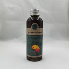 Crazy Growth Oil with Chebe Powder 100ml bottle with label on gray background.