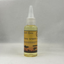 Crazy Growth Oil with Chebe Powder from South Africa product bottle on gray background.