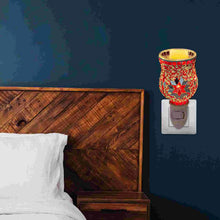 Creative Mosaic home fragrance plug-in diffuser for melting scented wax and diffusing essential oils in indoor spaces.