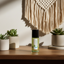 Creed men's body oil bottle for hydrating skin, softening rough areas, and everyday grooming.