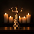 Cretan Snake Goddess statue, front view with raised arms holding snakes