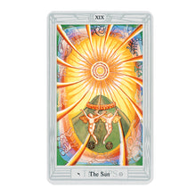 Crowley Thoth Tarot deck held in hand for scale
