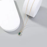 Crystal drop pendant necklace in boho gold style for festival fashion, daily accessorizing, and chic layered looks.