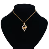 Crystal Teardrop Heart Urn Pendant cremation jewelry for holding a small amount of ashes in memory of a loved one.