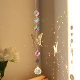Crystal Prism Sun Catcher Wind Chime hanging crystal piece for light catching, peaceful room decor, and window display.